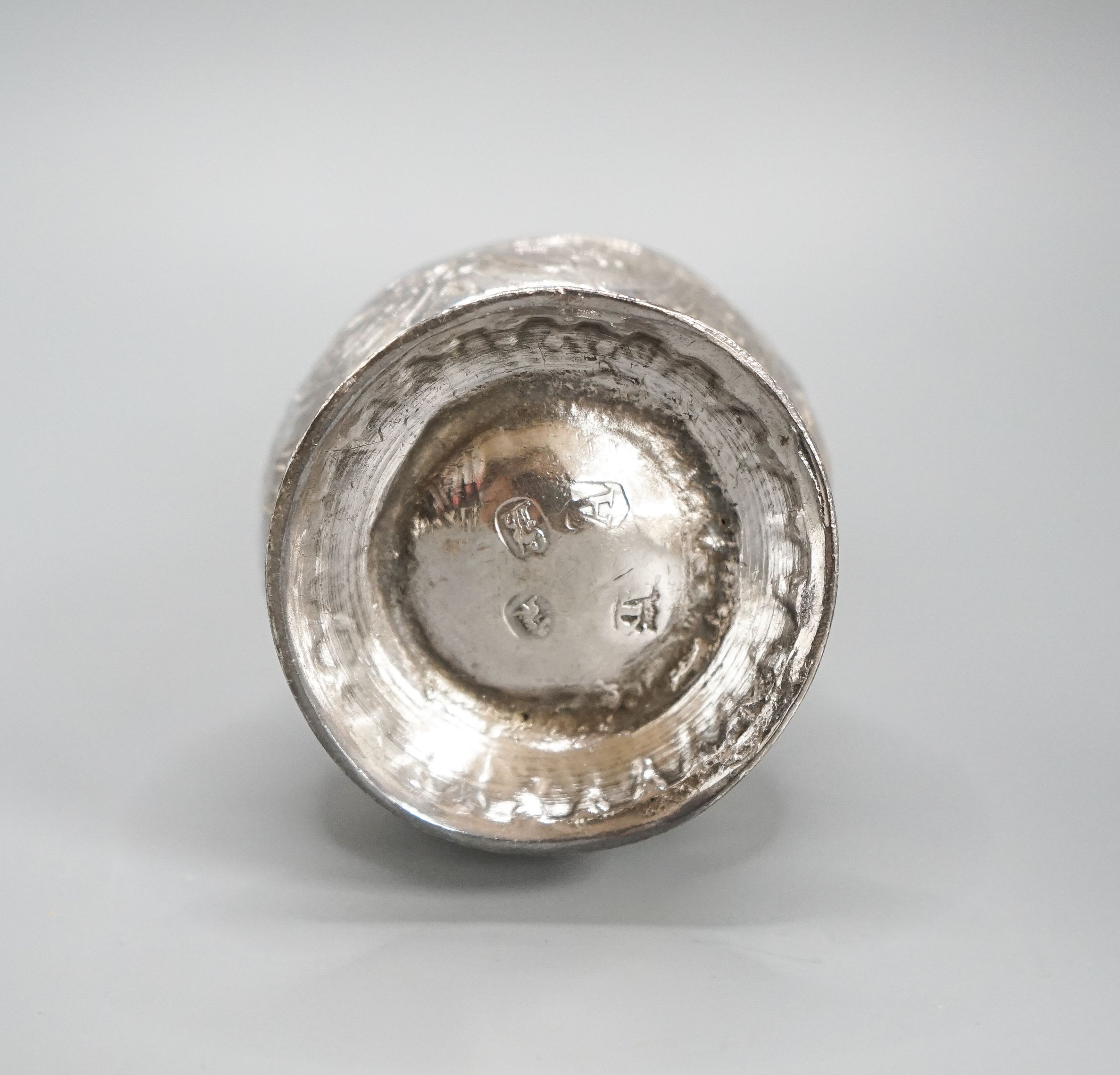 A George I silver sugar caster, with later? embossed decoration, Charles Adam, London, 1716, 13.5cm, 4.5oz.